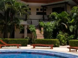Family Condo Escape 2BR Gated Pool Jacuzzis Security Terrace 2km Walk Beach and Town