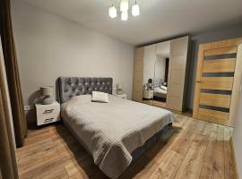 Pleasant stay 1-bedroom apartment, готель з парковкою у місті Шяуляй