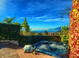 casa con piscina Jacuzzi AC wifi e biciclette elettriche, hôtel à Bordighera