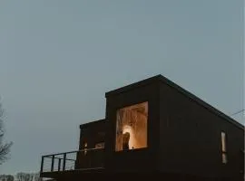 Three bespoke built cabins with hot tubs, mid Wales