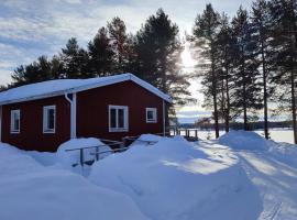 Fritidshus - Cottage - Holiday house - Soluppgång, hotel in Blattnicksele