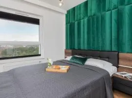 9th Floor Green and Grey Apartment in Gdańsk Brzeźno with Two Bedrooms and Parking by Noclegi Renters