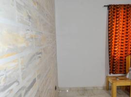 APPARTEMENT TOTSI AVENUE PYA, hotel in Lomé