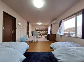 Guesthouse ONAKA 巡礼の宿 Pilgrim's Inn 家主居住型民泊, hotel com banheiras de hidromassagem em Mimase