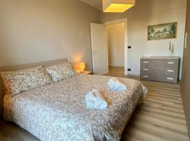 Elegante Appartamento Tre Amis - Doppio Garage & Free WiFi, apartment in Centallo