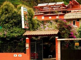 Hostal Chimenea, hotel a Baños