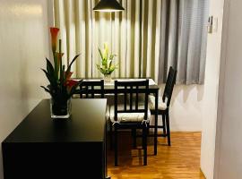 Modern Condo for Couple with Wi-Fi, Netflix & Kitchen, 1 min to MRT Boni