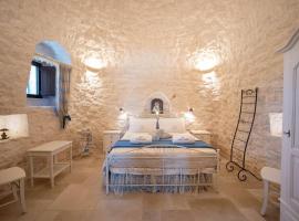 Valle D'Itria Trulli e Alcova Mikael, хотел в Чистернино