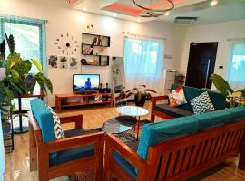 Bushis Crib Staycation Farmhouse ค็อทเทจในPanubigan