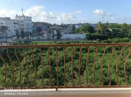 NYALI furnished rooms in an apartment with a pool
