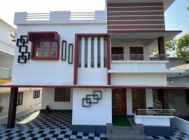 Happy Villa Homestay - 4, kæledyrsvenligt hotel i Chelakara
