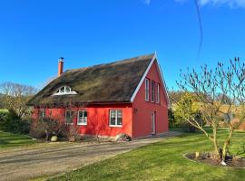 Ferienhaus am Lebbiner Bodden, готель з парковкою у місті Neuenkirchen