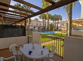 Adosado con jardin y piscina Palm Beach 86 ALBERT VILLAS, hotell i Alcossebre