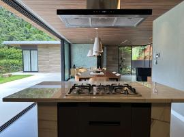 Casa Sofisticada c Vista Deslumbrante no Centro DM, hotel en Guilherme Paster