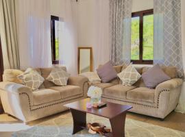 Roatan’s green view getaway., apartment in Roatán