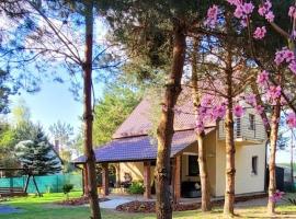 Całoroczny domek nad Jeziorem Piaseczno, cottage in Kaniwola