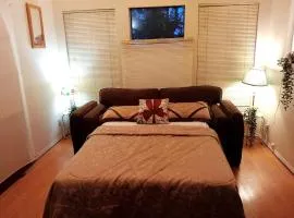 Comfortable Queen Bed in Open Living Room