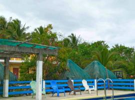Lotus Sun & Waves Beach Resort, hotel en Baler