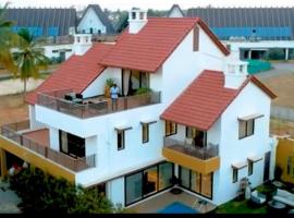 Fern Villa, ξενοδοχείο με πάρκινγκ σε Valsad