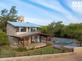 Dawn Ecstasy by StayVista - Hill-view villa with Modern interiors, Garden area & Indoor games