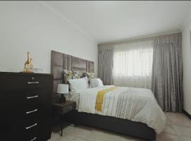 Bryanston Guest Cottage, hotel familiar en Johannesburgo
