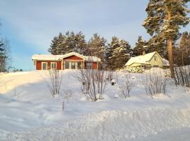 Charming cottage in Forsa, Hudiksvall with lake view, hotel in Hudiksvall