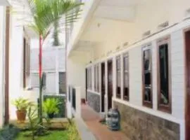 Hotel O Qq Kost Near Pantai Kebesaran Beach