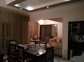 شقة ارضي بحديقة خاصة كمبوند الشيخ زايد