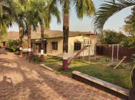 Nargis Farm Resort, habitación en casa particular en Murud