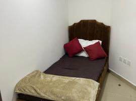 F30,R4,Single Room on the beach attach bath, B&B in Ajman