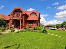 Dom drewniany z ogrodem, cottage in Szczecinek