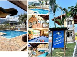 Casas Marimar a 300 mts da Praia com piscina, hidro ,sinuca e pebolim, hotel in Caraguatatuba