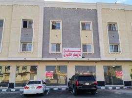 Nuzum International Apartment, hotel u gradu 'Sīdī Ḩamzah'