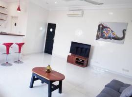 Appartement moderne K WhiteRed à pk10, Cotonou, hišnim ljubljenčkom prijazen hotel v mestu Cotonou