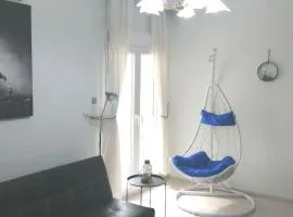 Blue swing chair apartment