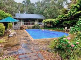 A Lovely Pool House in Forest