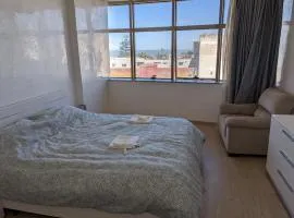 bedroom in the city center with seaview and shared bathroom