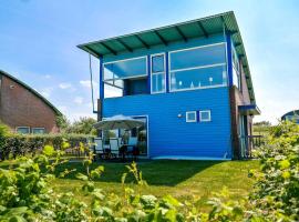 6pers. Lauwersmeer Lakefront. Nirvana house with sauna, pellet stove, hotel in Anjum