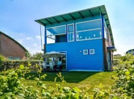 6pers. Lauwersmeer Lakefront. Nirvana house with sauna, pellet stove