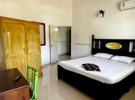 Easy Living Guesthouse, guest house in Orlim