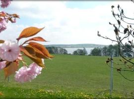 Ferienwohnung Mäckelborg am schönen Woblitzsee, hotel en Wesenberg