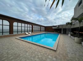 Flats beira mar - praia da costa，位于维拉维尔哈的酒店