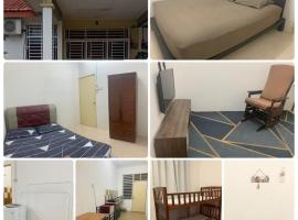 Homestay Rayyan PD, quarto em acomodação popular em Port Dickson