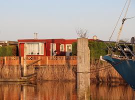 Haus Gaby direkt am Lauwersmeer, дом у озера в аренду в городе Anjum