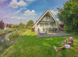 6 Pers - Holiday home with sunny terrace by a typical Dutch canal