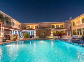 Al Dar Inn Hotel Apartment, apart-hotel em Ras al-Khaimah