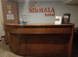 Votel Nirmala Hotel Malang, hotel con estacionamiento en Bareng