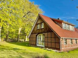 Ferienhaus am Wingster Wald (Alleinlage), hotel in Wingst