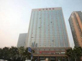 Wuhan Soluxe Hotel, hotell i nærheten av Whuan Tianhe internasjonale lufthavn - WUH i Wuhan