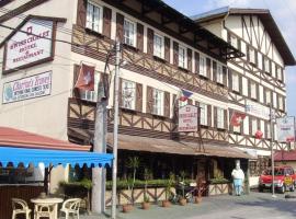 Viesnīca Swiss Chalet pilsētā Malabañas, netālu no vietas Clark Starptautiskā lidosta - CRK